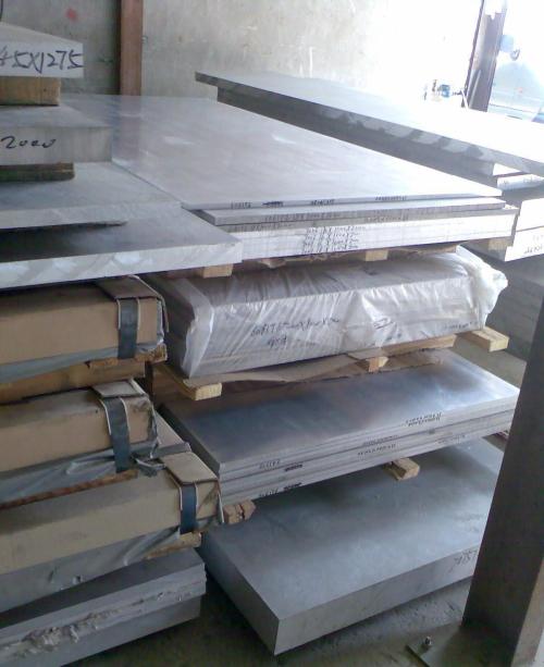 哈爾濱鋁扣板-白色弧形鋁單板打造哈爾濱歌劇院的柔和曲面外觀